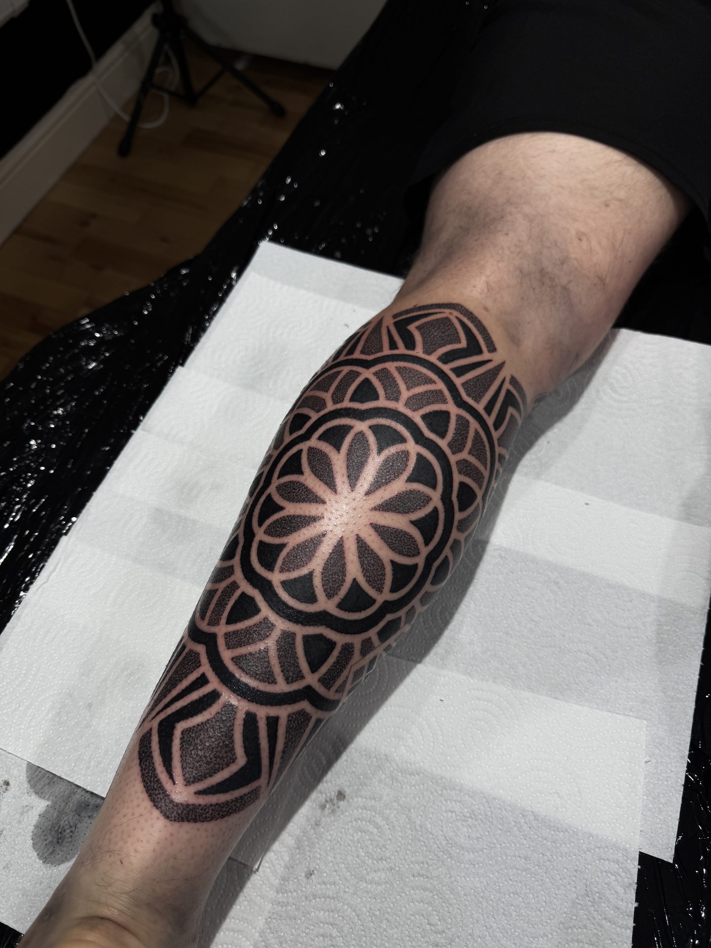 Geometric calf and shin tattoo by Liam Couper