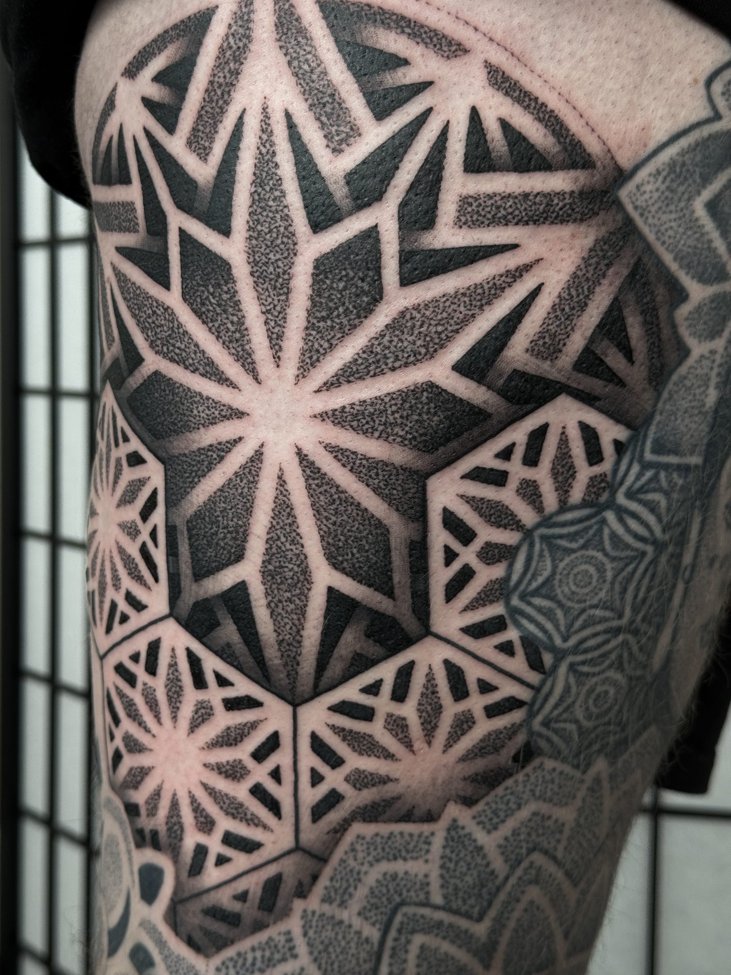 Mandala elbow tattoo by Liam Couper