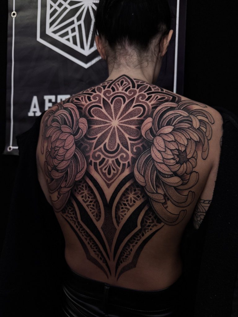 Ornamental blackwork back piece tattoo by Liam Couper, Fife