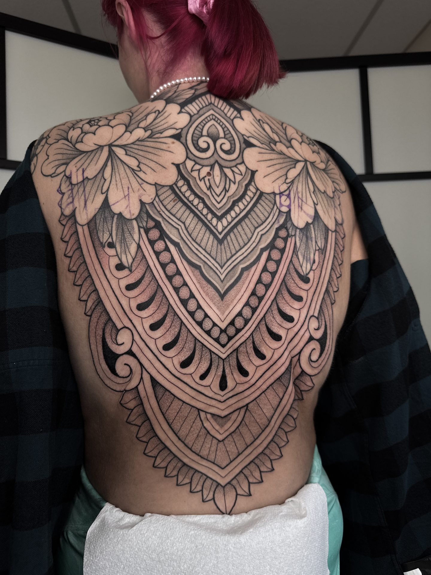 Large ornamental and floral back piece by Liam Couper