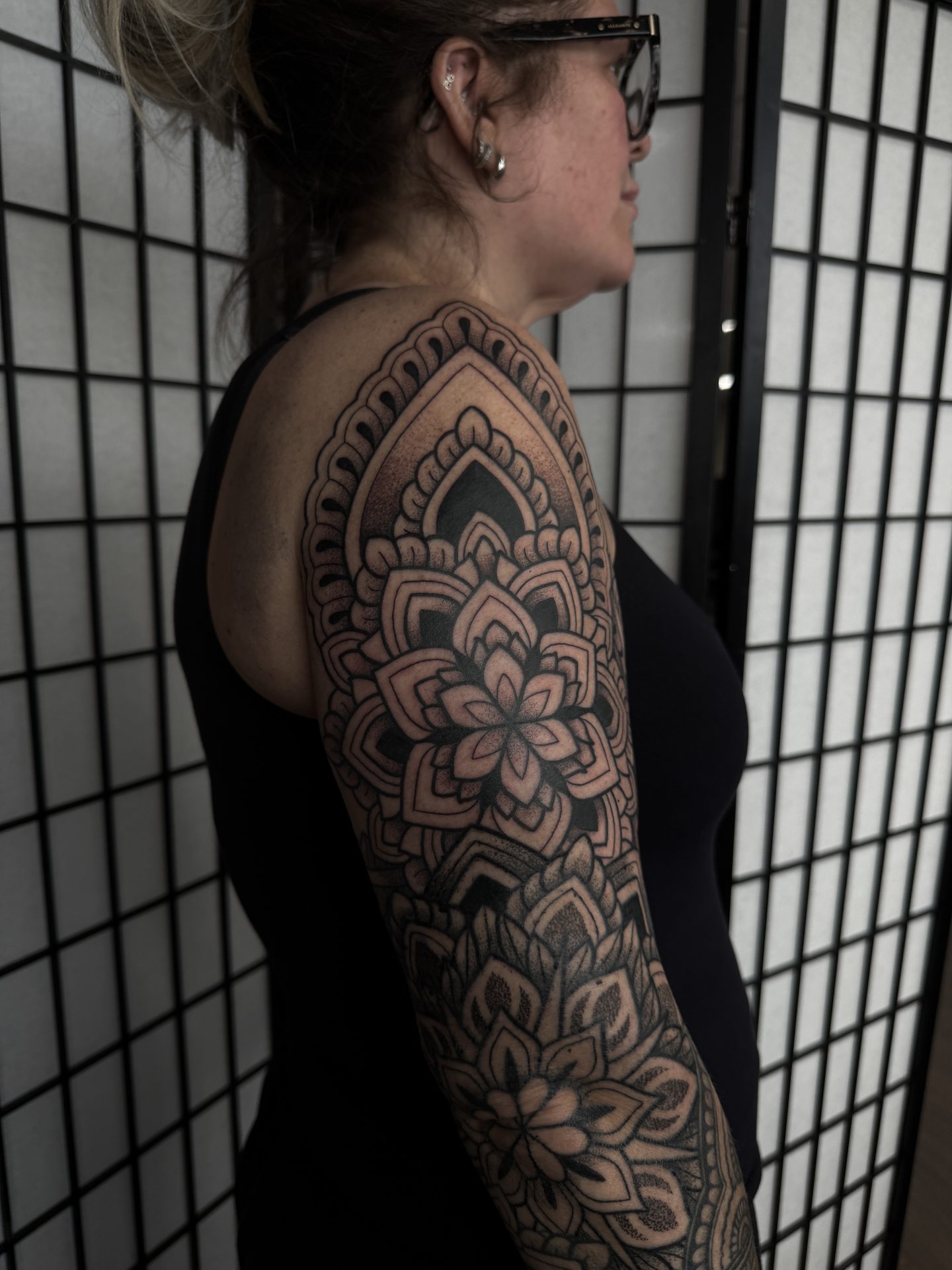 Ornamental half sleeve tattoo by Liam Couper