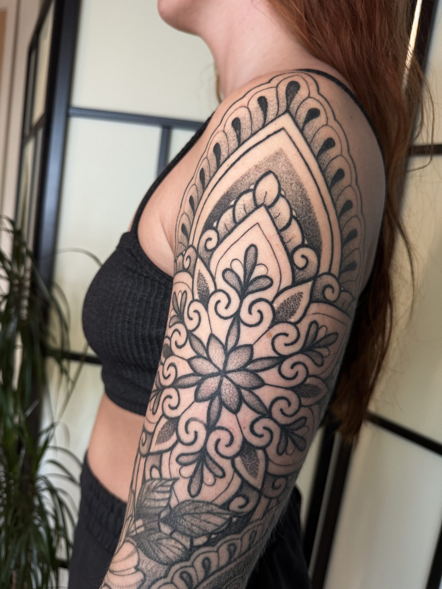 Lace pattern ornamental sleeve tattoo by Liam Couper